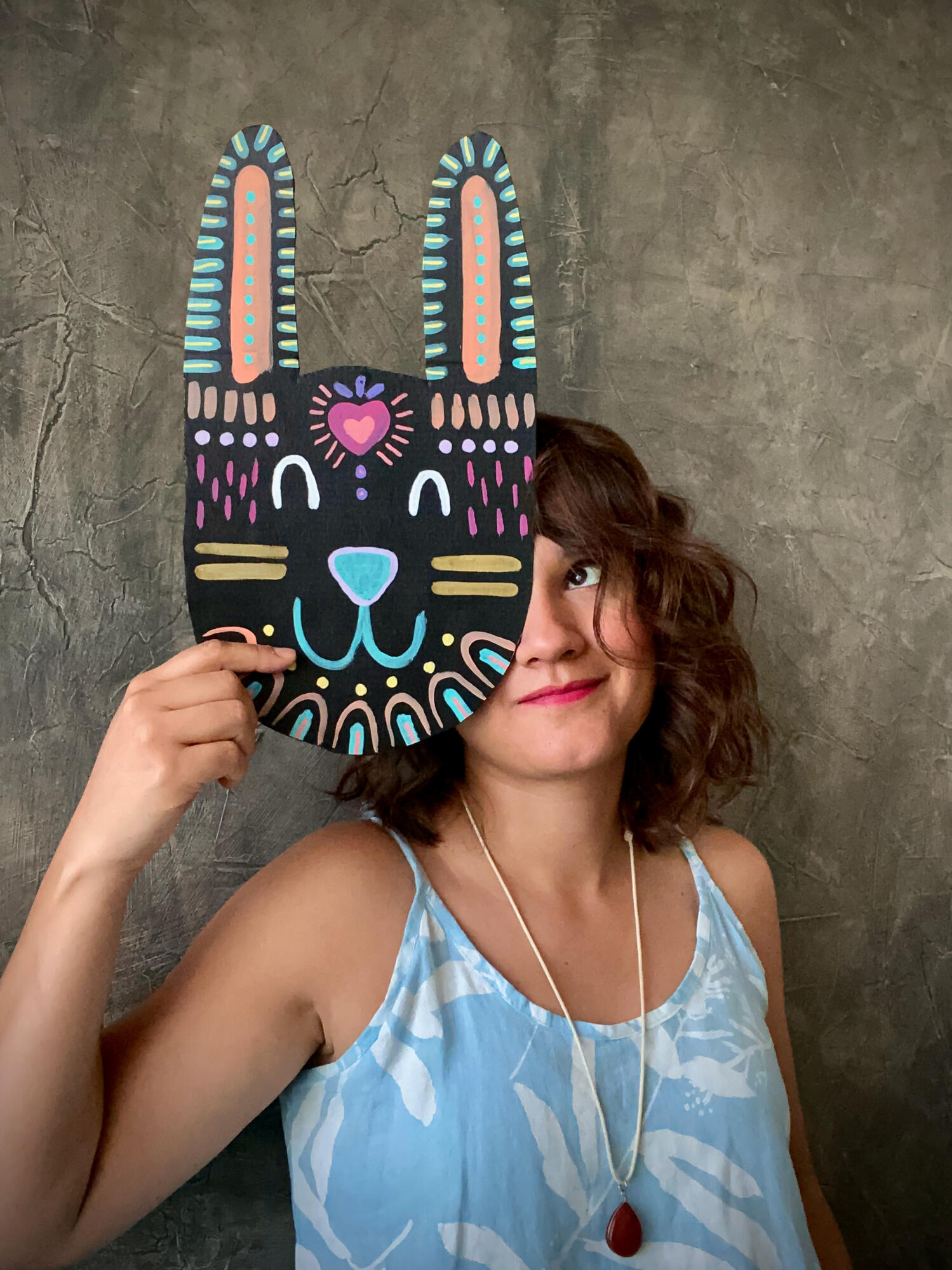 joanna with tochtli mask